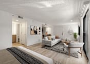 Thumbnail 18 of 92 - A modern living room with a white couch and a coffee table.