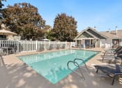 Thumbnail 33 of 92 - our resort style swimming pool is next to our house with lounge chairs at AVIA Lofts on Parkway Apartments, Vancouver, 98662