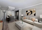 Thumbnail 25 of 41 - a living room with a white couch and a table