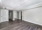 Thumbnail 31 of 41 - the living room of a new home with white walls and wood floors