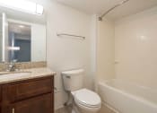 Thumbnail 71 of 108 - a bathroom with a sink toilet and bathtub