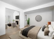 Thumbnail 46 of 108 - a bedroom with a bed and a bathroom with a tv