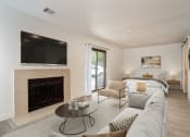Thumbnail 44 of 108 - the preserve at ballantyne commons living room with fireplace and couch