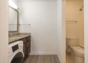 Thumbnail 69 of 108 - a bathroom with a sink and a toilet