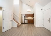 Thumbnail 54 of 108 - a kitchen and dining area in a 555 waverly unit