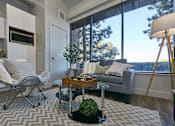 Thumbnail 45 of 55 - Couch and table at Brickside Heights Apartments, Millcreek, UT