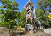 Thumbnail 50 of 50 - a water tower with a sign in front of it  at The View on 20th, Ogden