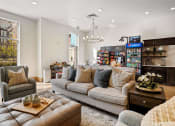 Thumbnail 37 of 83 - a living room with couches and chairs and a coffee table at 200 City View, Provo, UT
