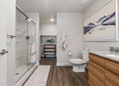 Thumbnail 128 of 136 - a bathroom with a glass shower and a toilet at The Flats at Riverwoods, Provo, 84604