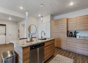 Thumbnail 109 of 136 - modern kitchen with stainless steel appliances at The Flats at Riverwoods, Provo