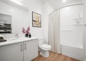 Thumbnail 67 of 126 - a bathroom with a shower and a sink and a toilet  at SevenO2 Main Apartments, Salt Lake City
