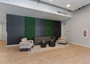 Thumbnail 66 of 131 - commons lobby with couches and chairs at Paperbox Lofts, Salt Lake City, UT, 84101