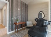 Thumbnail 65 of 131 - a salon room with a black chair and a mirror at Paperbox Lofts, Utah