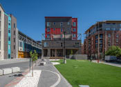 Thumbnail 102 of 131 - a view of a building with a lawn in front of it at Paperbox Lofts, Salt Lake City, Utah