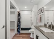 Thumbnail 82 of 84 - a bathroom with a shower and a toilet and a sink at The Revival, Salt Lake City, 84101