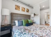 Thumbnail 76 of 84 - a bedroom with a large bed and pillows at The Revival, Salt Lake City, Utah