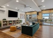 Thumbnail 32 of 84 - a living room with a couch and a tv at The Revival, Salt Lake City