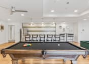 Thumbnail 28 of 84 - the pool table in the living room of a house with a bar and a bill at The Revival, Salt Lake City, Utah