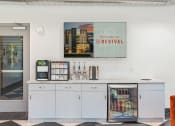 Thumbnail 18 of 84 - a counter with a vending machine and a sign that reads welcome to the revival at The Revival, Salt Lake City