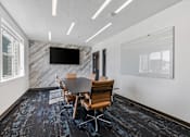 Thumbnail 54 of 136 - conference room with table and chairs at The Flats at Riverwoods, Provo, Utah