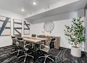 Thumbnail 33 of 136 - a conference room with a table and chairs at The Flats at Riverwoods, Provo, 84604