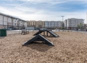 Thumbnail 42 of 50 - a playground with a ramp and a picnic table in a parkat The View on 20th, Ogden, UT, 84401