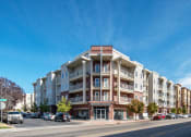 Thumbnail 1 of 50 - an apartment building on the corner of a city streetat The View on 20th, Ogden, UT