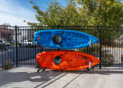 Thumbnail 19 of 50 - two kayaks on a rack in front of a fenceat The View on 20th, Utah