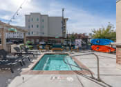 Thumbnail 17 of 50 - our apartments have a swimming pool and a patio with lounge chairsat The View on 20th, Ogden, UT, 84401