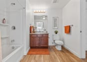 Thumbnail 40 of 50 - a bathroom with a shower toilet and sink and a bath tubat The View on 20th, Utah