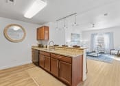Thumbnail 36 of 50 - the view of a living room and a kitchen with a counter topat The View on 20th, Ogden, UT, 84401