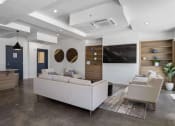 Thumbnail 43 of 136 - a living room filled with furniture and a flat screen tv at The Flats at Riverwoods, Utah, 84604