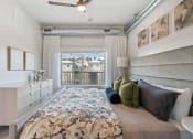 Thumbnail 75 of 84 - a bedroom with a large bed and a window at The Revival, Utah, 84101