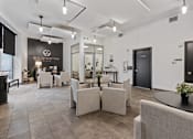 Thumbnail 27 of 71 - A modern waiting room with a black and white color scheme at Wilmington Flats Apartments, Salt Lake City, Utah