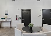 Thumbnail 30 of 71 - A black door with the word Luxe on it is in a white room at Wilmington Flats Apartments, Salt Lake City, UT, 84106