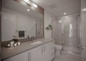 Thumbnail 11 of 22 - a bathroom with a toilet sink and shower
