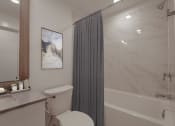 Thumbnail 21 of 22 - a bathroom with a toilet and a bathtub