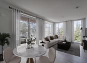 Thumbnail 5 of 22 - a living room with a couch and a table and big windows