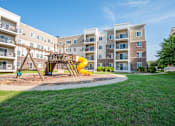 Thumbnail 3 of 11 - private playground at the flats at big tex apartments