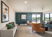 Thumbnail 30 of 52 - the residence on lamar apartment living room with couches and chairs