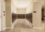 Thumbnail 47 of 52 - a large wine cellar with rows of wine racks and a door