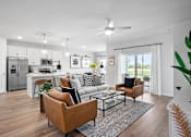 Thumbnail 6 of 19 - A modern living room with a brown leather sofa and a glass coffee table.