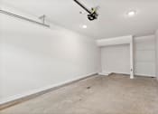 Thumbnail 62 of 62 - A room with a white door and a white wall.