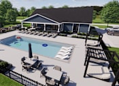 Thumbnail 16 of 19 - A pool with a slide and sun loungers.
