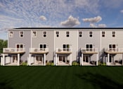 Thumbnail 3 of 15 - A row of identical houses with balconies.