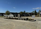 Thumbnail 38 of 43 - an empty parking lot in front of a house