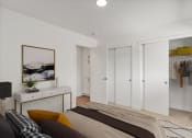 Thumbnail 4 of 28 - a bedroom with white walls and white closets