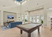 Thumbnail 4 of 20 - our apartments offer a clubhouse with a pool table