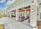 Thumbnail 9 of 20 - our apartments showcase a beautiful screened in porch
