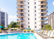 Thumbnail 5 of 26 - Luxury, resort-style pool with poolside chairs at Prospect Place, NJ 07601